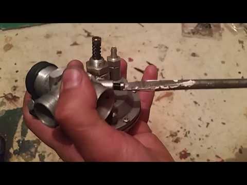 Видео: Замена частей на карбюраторе КМП -100 АР