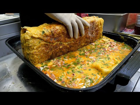 Видео: 60 яиц! гигантский свернутый омлет - корейская уличная еда