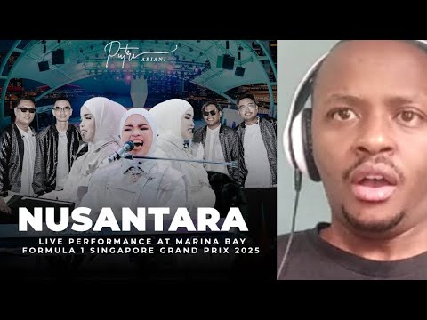 Видео: ПУТРИ АРИАНИ Реакция - НУСАНТАРА (ЗЕМЛЯ ХРАБРЫХ) - F1 СИНГАПУР ЖИВОЕ ВЫСТУПЛЕНИЕ