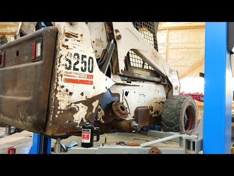 Видео: Подробная замена уплотнителя колеса Bobcat с помощью обычных инструментов *удовлетворительно*