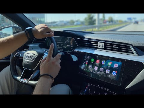 Видео: Тест драйв Audi e-tron