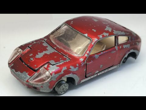 Видео: Ремонт корги Mini Marcos GT 850 №341. Литая модель игрушки.