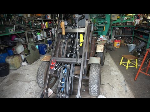 Видео: Самодельный минипогрузчик. Гидравлика.