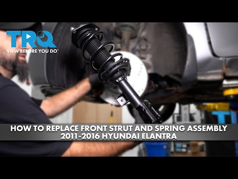 Видео: Как заменить переднюю стойку и пружину в сборе на Hyundai Elantra 2011-2016 годов