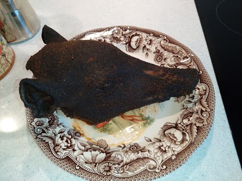 Видео: Запечённая голова молодого кабана