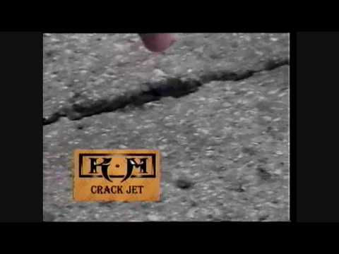 Видео: Ремонт трещин в асфальте, санация трещин