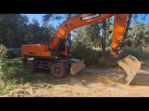 Видео: Обзор на DOOSAN 190