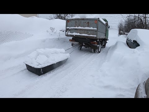 Видео: Вывоз снега на мультикаре. Чистка территорий от снега трактором. #multicar #снег