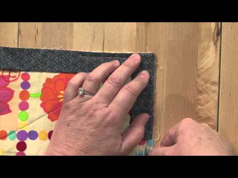 Видео: Легко скошенные углы для подшивки одеяла