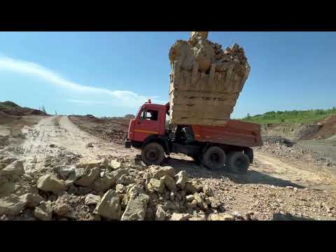 Видео: Работа на экскаваторе, глиняный карьер