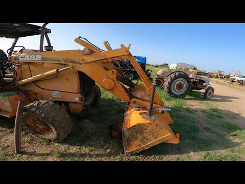Видео: Переупаковка цилиндра экскаватора-погрузчика Case