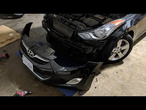 Видео: Снятие переднего бампера Hyundai Elantra 2011 года