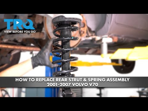 Видео: Как заменить заднюю стойку и пружину в сборе на Volvo V70 2001-2007 гг.