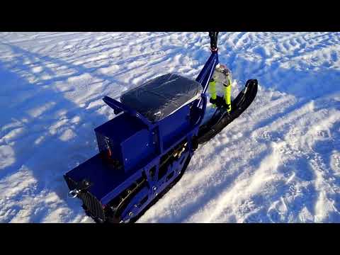 Видео: Электро снегоход