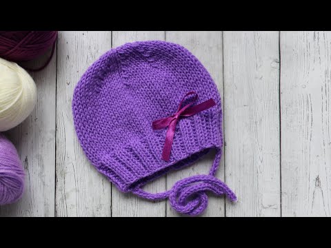 Видео: Шапка для новорождённых спицами💜 шапка с завязками на выписку из роддома