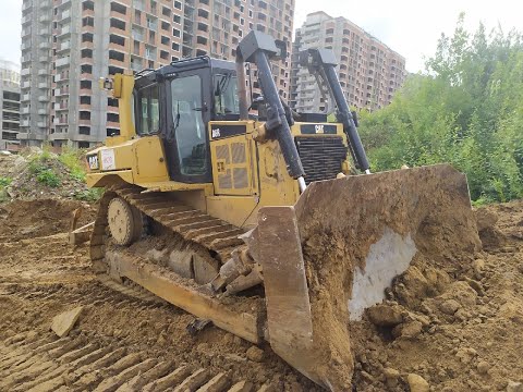 Видео: Как управлять бульдозером CAT D6, органы управления Caterpillar