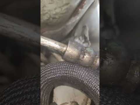 Видео: Замена шланга гидроусилителя руля Grand Caravan 3,8 л 2005 года. Лучшее руководство.