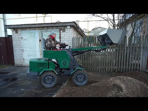 Видео: Самодельный минипогрузчик в работе.