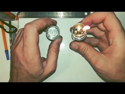 Видео: Зажигалка из фонарика
