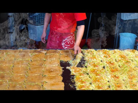 Видео: Самые быстрые работники - удивительное мастерство мастера окономияки - японская уличная еда