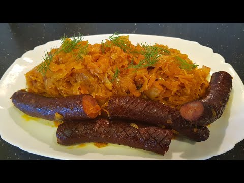 Видео: Тушёная квашеная капуста с копчёными колбасками #тушёнаякапустаколбаски