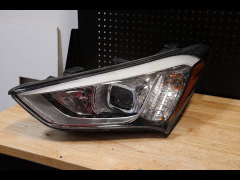 Видео: Разборка галогенной фары Hyundai Santa Fe 2013-2016