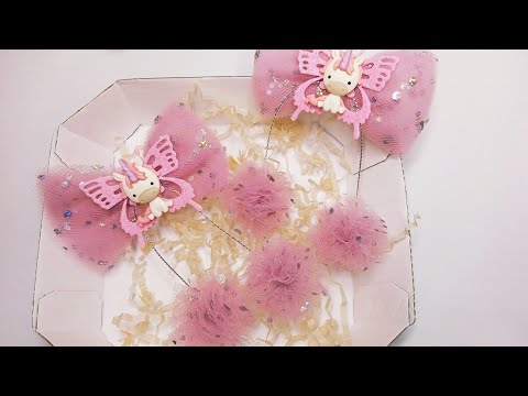 Видео: Делаются просто, а выглядят шикарно! Удивительные бантики из фатина