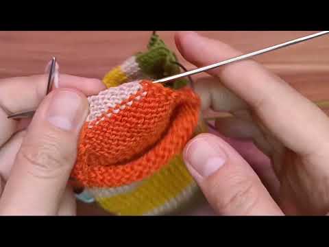 Видео: Пятка бумеранг на двух спицах