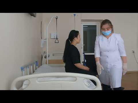 Видео: Пересаживание пациента с кровати на кресло каталку