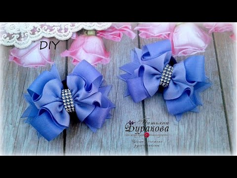 Видео: 🎀 Бантики из лент 🎀 Канзаши 🎀 Ribbon bow Kanzashi 🎀 Hand мade 🎀 DIY Bows bow