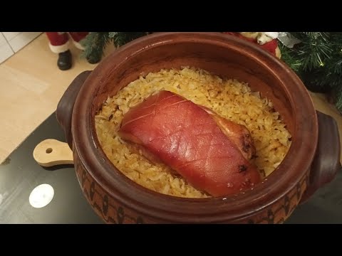 Видео: Свинско с кисело зеле в гювеч