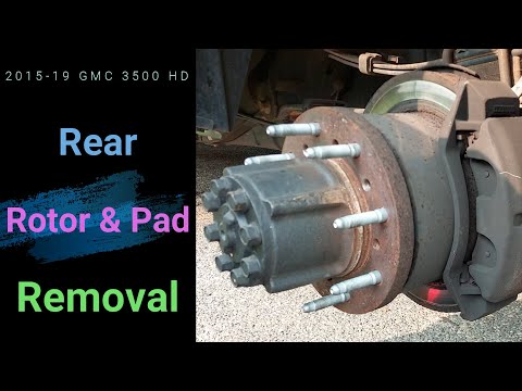 Видео: Снятие заднего ротора и тормозных колодок GMC 3500HD 2015-19