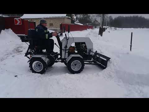 Видео: Уборка снега самодельным минитрактором