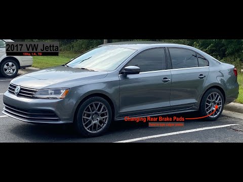 Видео: VW Jetta 2017: замена задних тормозных колодок