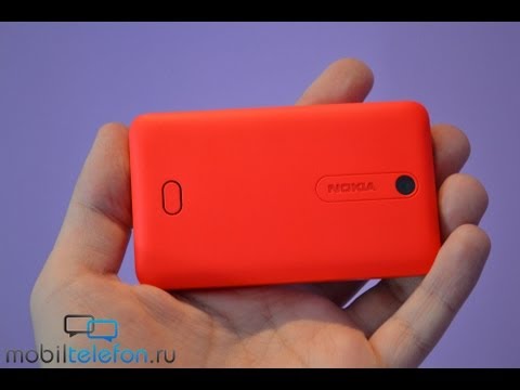 Видео: Обзор Nokia Asha 501 (review): бюджетненько и стильненько