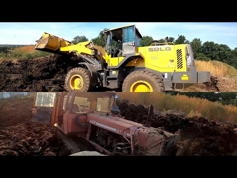 Видео: Кто первым застрянет ДТ 75 или SDLG 936 фронтальный погрузчик?