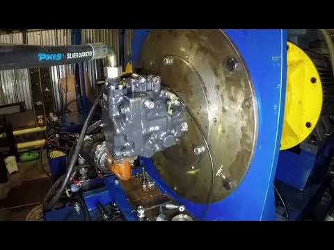 Видео: Диагностика насоса Komatsu WB 97 S