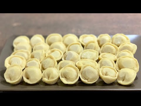 Видео: Пелмени - вкусотия от руската кухня. Любителите на равиоли и спагети ще се влюбят в пелмените!