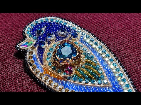 Видео: Бисероплетение. Урок 41. Брошь "Птичка"