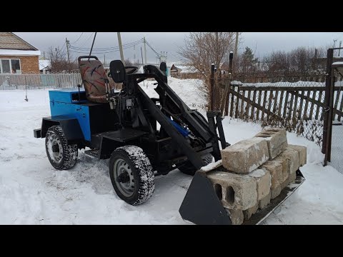 Видео: Испытания погрузчика на грузоподъёмность. Чистка снега.