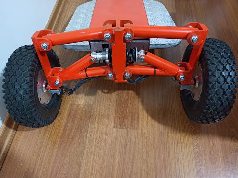 Видео: Как сделать наклонную подвеску трехколесного электрического скутера?