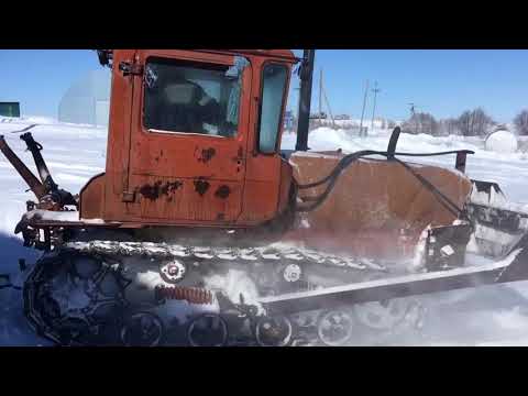 Видео: Дт-75 расчистка снега