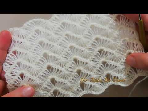 Видео: Великолепный узор для вязания с ажурным узором, который можно использовать в жилетах и ​​свитерах.