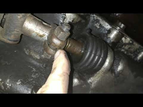 Видео: Регулировка кулисы коробки передач Форд Эскорт 91 1,4 моно