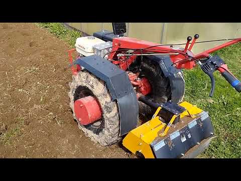 Видео: Мотоблок МТЗ с двигателем Вейма 13 л.с.Фрезеровка почвы.