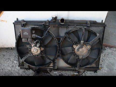 Видео: Lancer 9. Замена радиатора охлаждения двигателя.