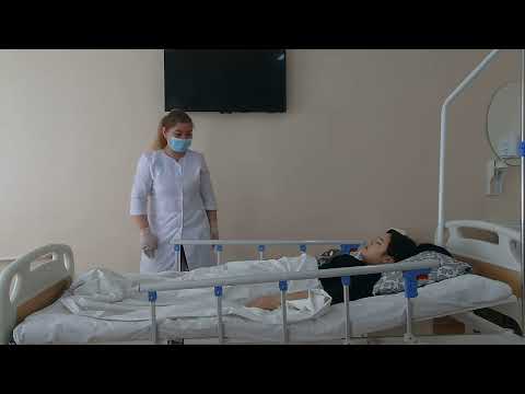 Видео: Укладывание пациента в положение Фаулера