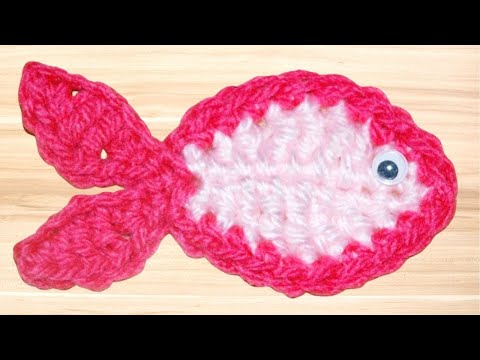 Видео: Как связать крючком аппликацию «Рыбка» для начинающих
