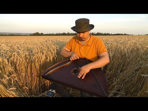 Видео: На молитве Русская Земля Песня под Гусли / Гусляр Андрей Андреев