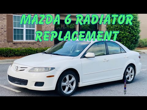 Видео: Как заменить радиатор Mazda 6 2003 - 2008 2.3L